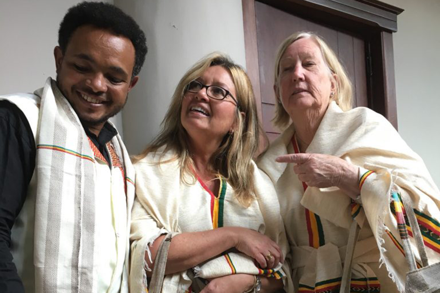 Flavia Ramos-Mattoussi posing with two colleagues