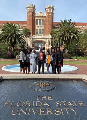 "Group from Grenada posing in front of the Westcott Building on the FSU campus."