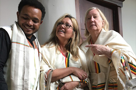 "Dr Ramos-Mattoussi, Dr. Fesmire and a man posing for a photo."