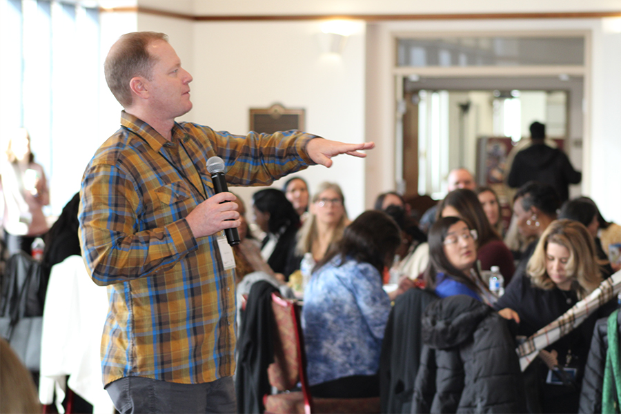 "Dr. Schoen presenting to a crowd in at the LSI retreat."