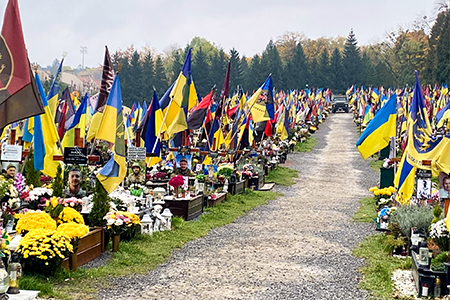 "In Kyiv, Ukrainian flags mark the loss of the lives of Ukrainian soldiers during the war. "
