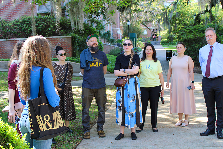 DakhaBrakha walking outdoors on the FSU campus 