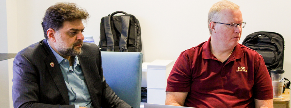 Rabieh Razzouk and Jim Reynolds at a meeting.