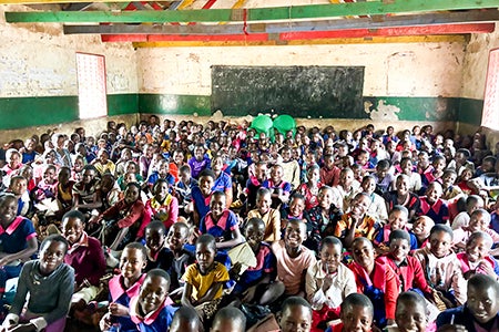 Large classroom full of children in Malawi.