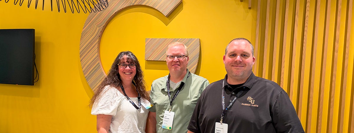 Carrie Meyers, Jim Reynolds and Robert Hanna pose for a photo at Google headquarters.