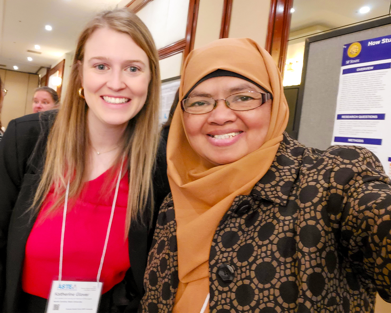 Dr. Ely and a colleague taking a selfie at a conference in California. 