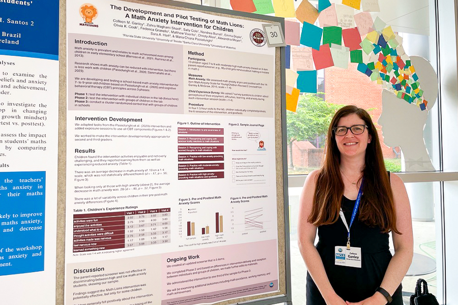 Colleen Ganley presenting a poster about her research
