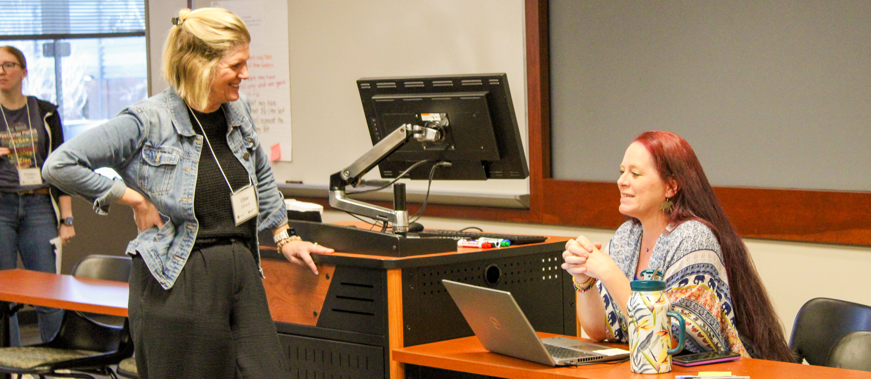 Heather French talking with one of the workshop participants.
