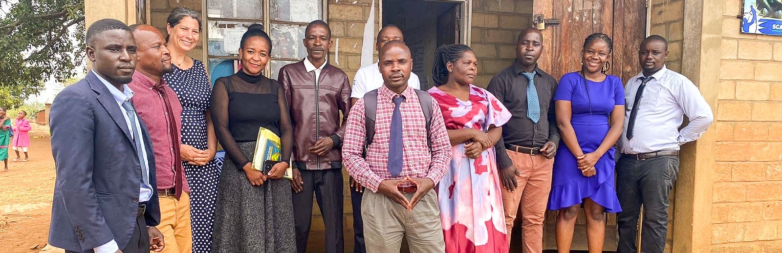 Group of researchers posing for a group photo in Malawi