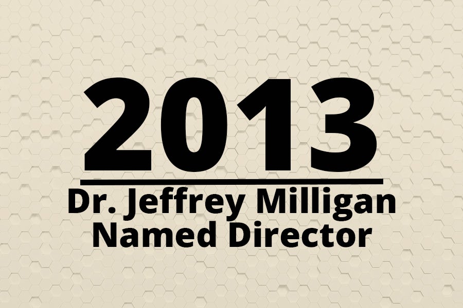 Graphic says  2013 Dr. Jeffrey Milligan Named Director