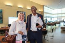 Two people posing for a photo at Santa Fe College