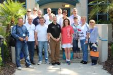 CCAP Ukraine group photo in the lobby of a building with the director of public safety at Santa Fe College