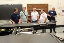 One of the presenters talking with three members of the CCAP Ukraine group 