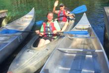 Two people in a canoe