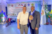 Two men posing for a photo