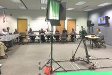 CCAP Indonesia group members sitting around a table in a classroom