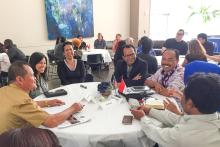 CCAP Indonesia group members sitting around a table 