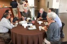 Group in the midst of a roundtable discussion