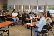 CCAP South Africa group members listening to a presentation inside a classroom  at Florida State University