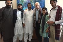 Six  people posed for a group photo