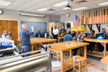 Members of the CCAP South Africa group inside a classroom at Santa Fe College listening to a speaker