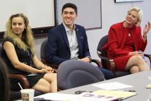 Three members of the Ukraine CCAP  around a conference table