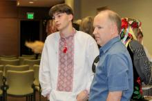 Two guests having at the Vyshyvanka Day celebration at The Globe.