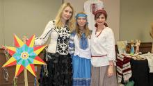 Dr. Anna Romanova poses for a photo with guests at the Vyshyvanka Day celebration.