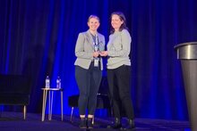 Cook receiving an award on Friday, March 13, at the NPA’s annual conference in San Francisco.