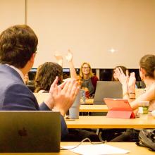 Dr. Anna Romanova smiling as members of the FSU Student Senate celebrate the passage of the Proclamation Recognizing FSU’s Ukraine Task Force