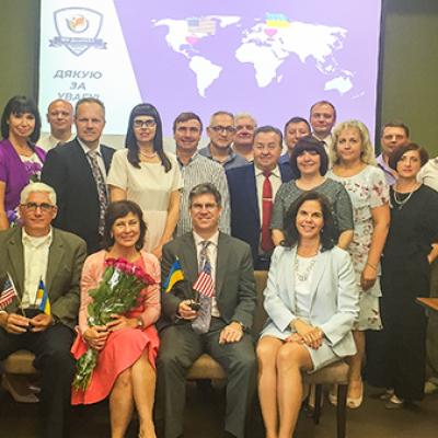 Dr. Fuentes and Dr. Milligan pose for a group photo on a visit to Ukraine in 2018.
