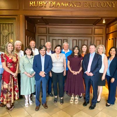 Ukrainian visitors posing for a group photo with the FSU president, first lady and the FSU provost. 