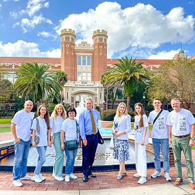 Group photo in front of the Westcott Building on the FSU campus. 