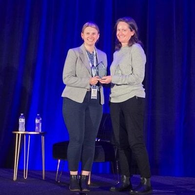 Cook receiving an award on Friday, March 13, at the NPA’s annual conference in San Francisco.