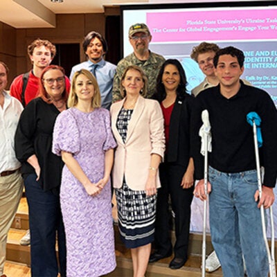 Kateryna Shynkaruk poses for a group photo following her lecture at FSU's Globe Auditorium. 