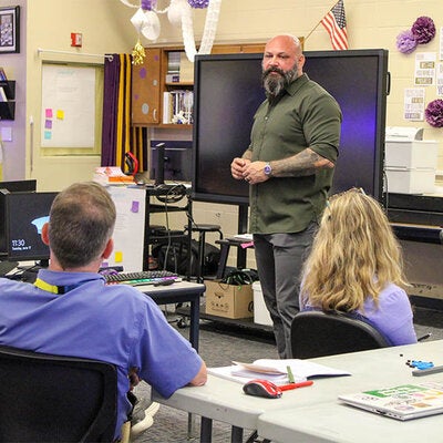 FSU InSPIRE Director Drew Allen addresses attendees at a professional learning course.
