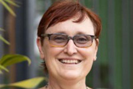 Headshot photo of Angi Yoder Maina