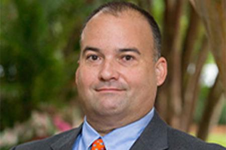 Headshot photo of Dr. Bill Hunkapiller