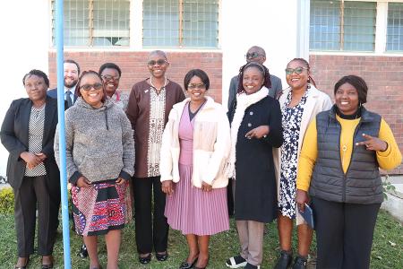 Group photo with the USAID assistant administrator. 