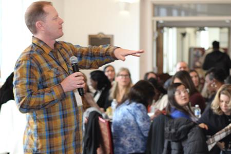 Rob Schoen talking to an audience. 