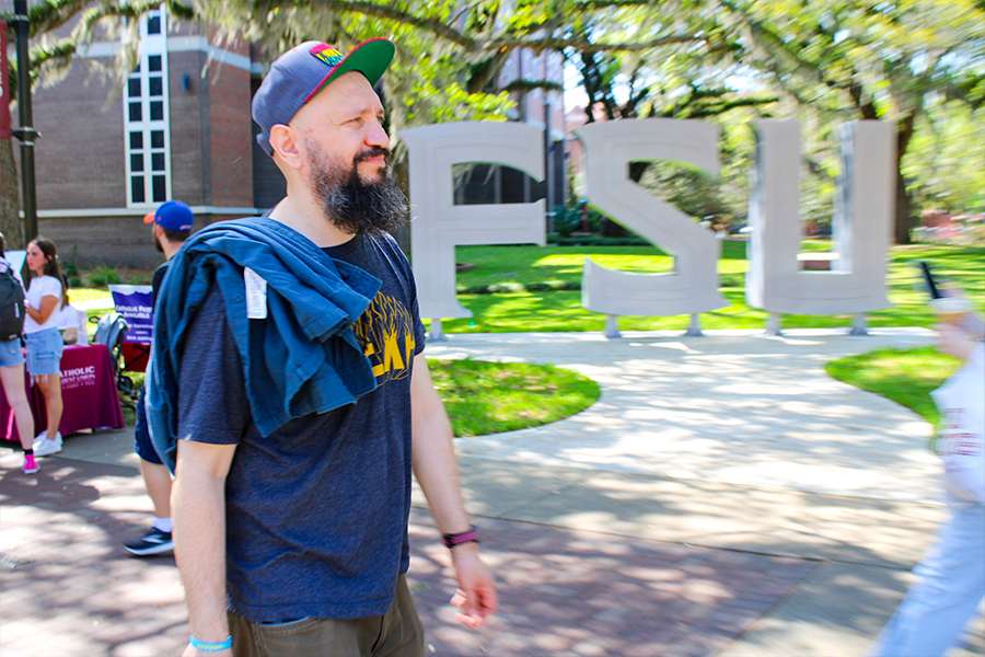 DakhaBrakha walking outdoors on the FSU campus at the student union